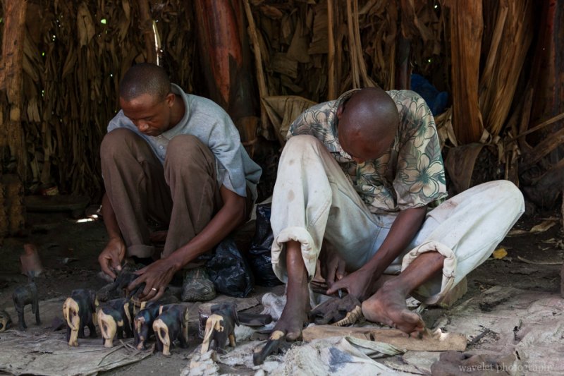 Locals carving the wood near Mto wa Mbu