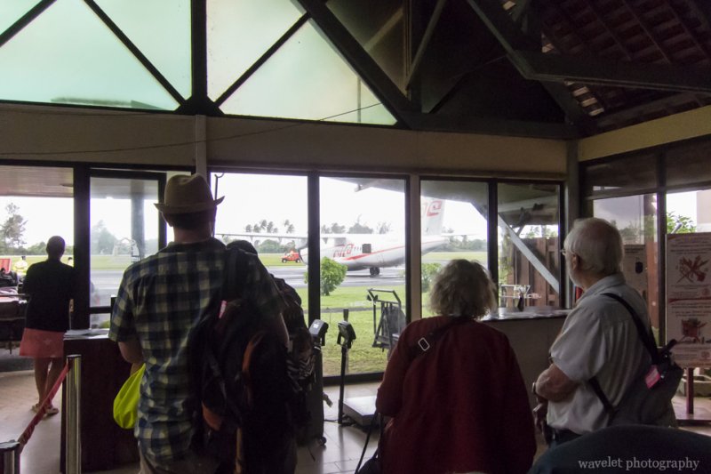 Passengers anxiously waiting for the plane at Moorea Airport