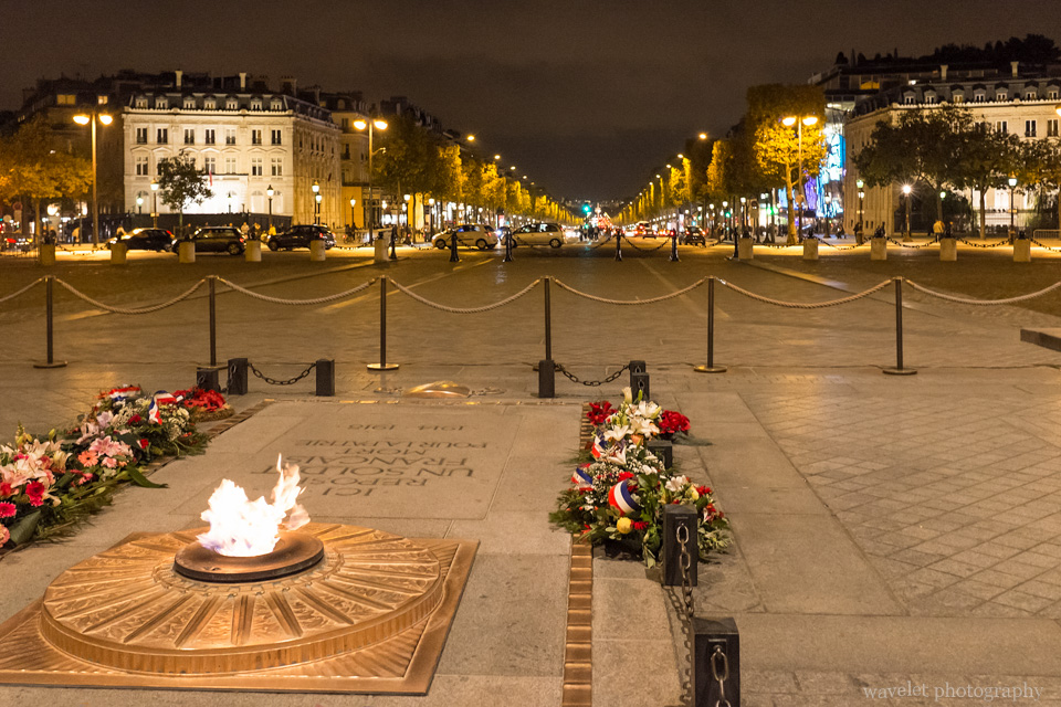 Eternal Flame at the Arc de Triomphe facing the Champs-Élysées, Paris