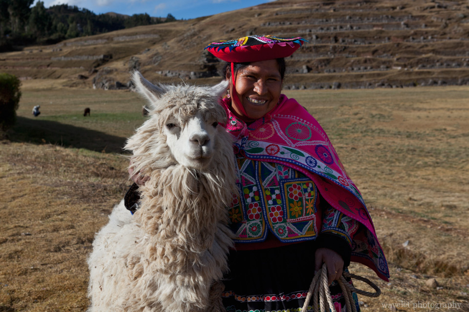 Woman in traditional clothing with her Alpaca, Sacsayhuamán