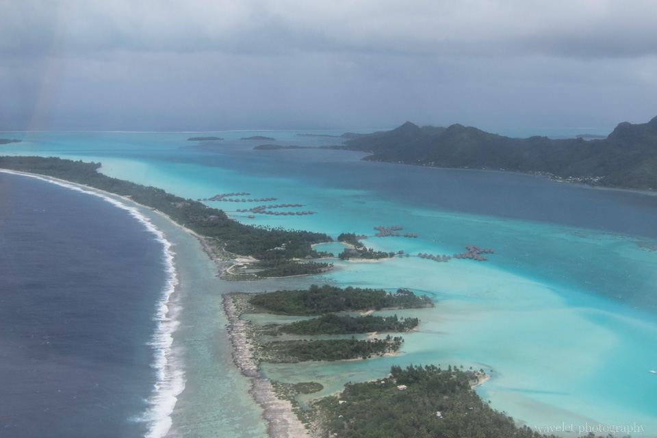 Overlook Bora Bora\'s lagoon from the airplane
