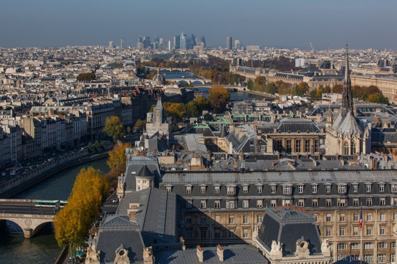 Overlook River Seine and La Défense from the top of the bell tower of Notre-Dame de Paris